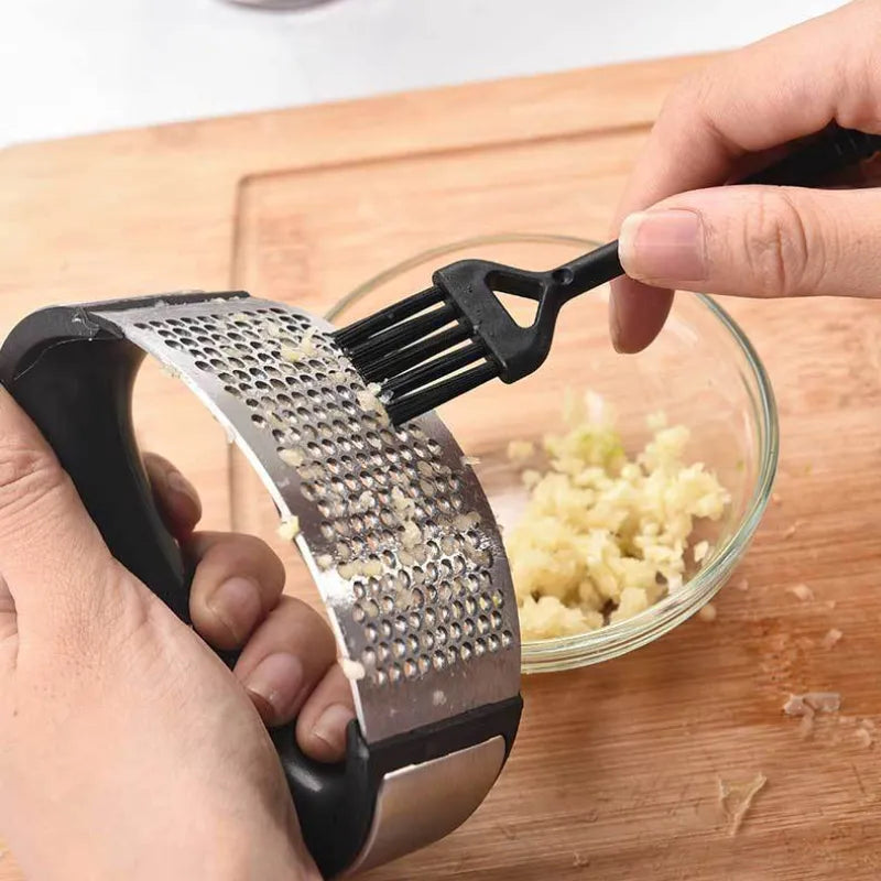 Stainless Steel Manual Garlic Press - Compact and Efficient Kitchen Gadget for Mincing Garlic